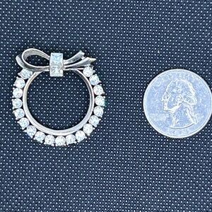 Elegant Silver Crystal Bow Pendant